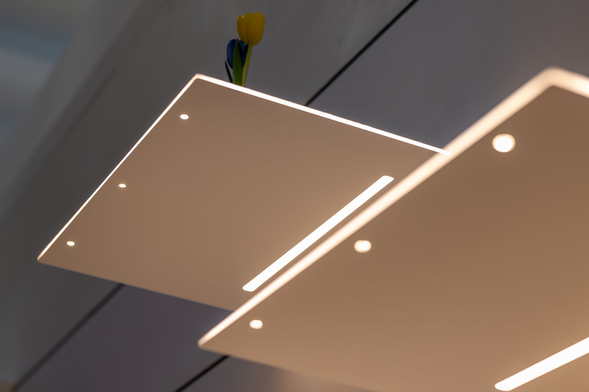 Delicate rectangular shelves with integrated underlighting, minimalist design